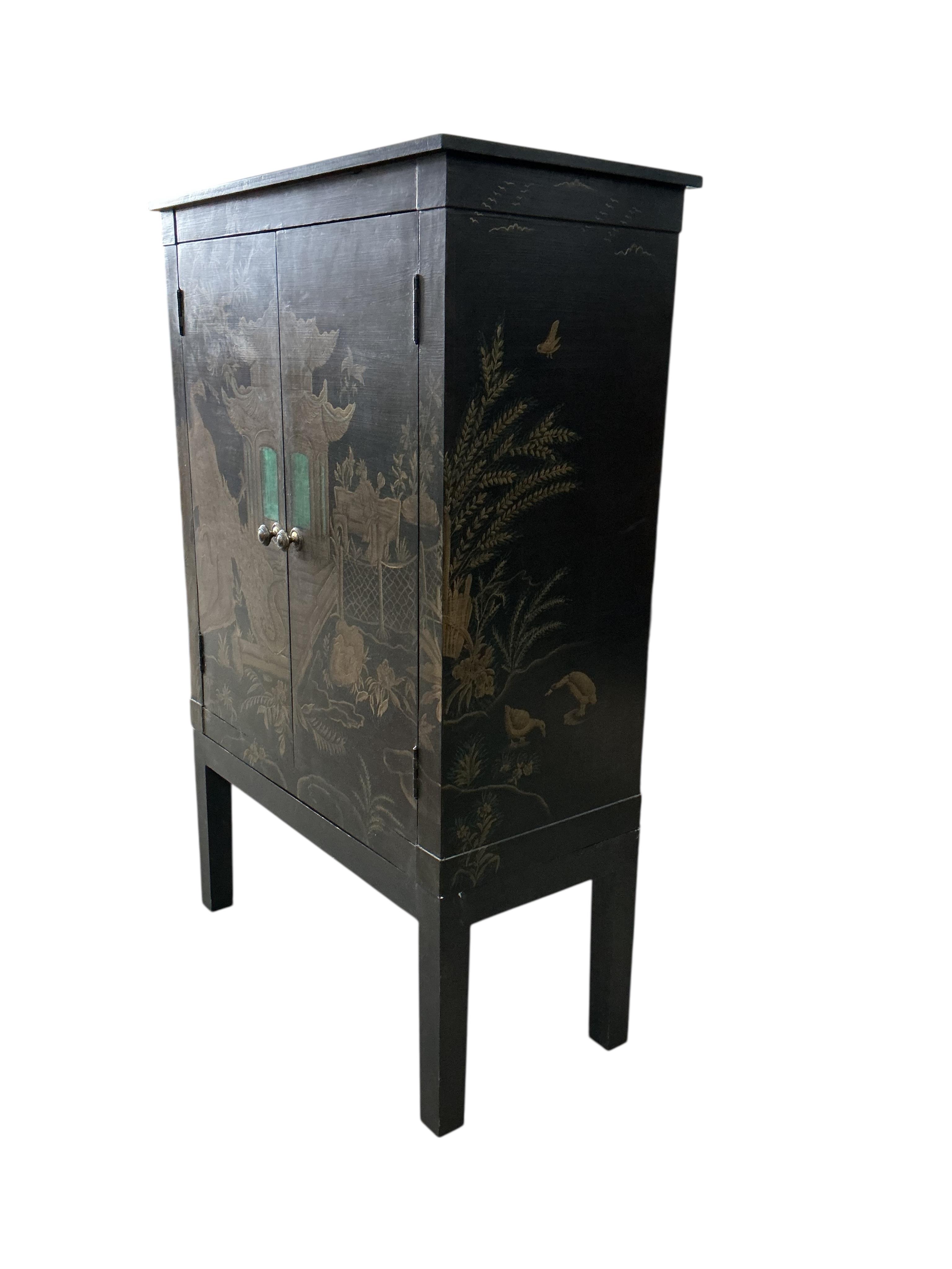 An OKA 'Peking' television cabinet, width 90cm, depth 46cm, height 140cm